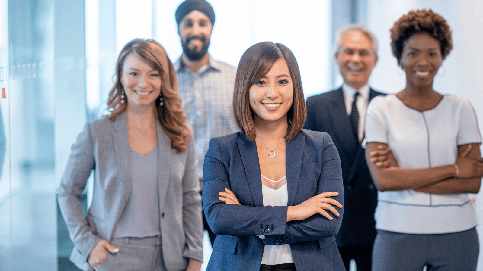 Corporate yoga session for employees in a Dubai office building